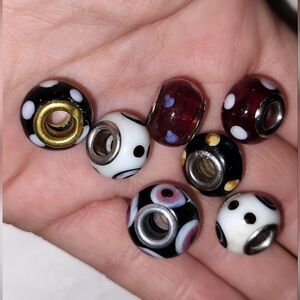 Lot of 7 different polka dotted glass Murano beads